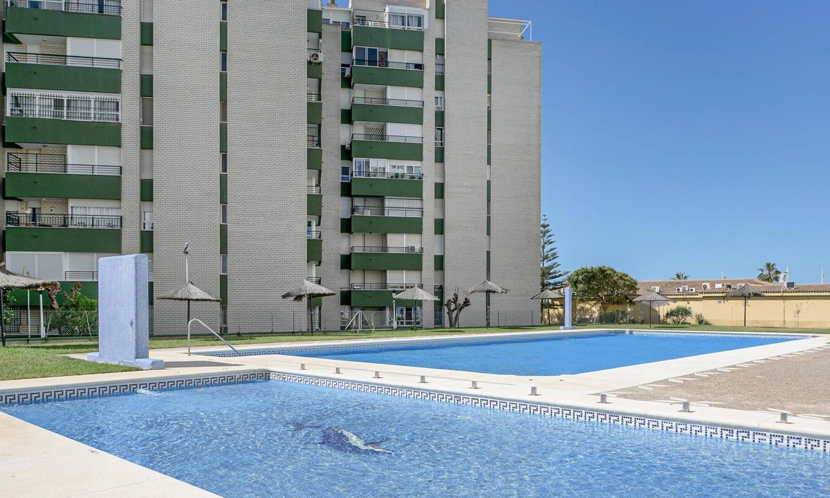 Valdelagrana Apartment | Apartment “Centro Paseo Marítimo Valdelagrana” directly on the Beach with Pool, Wi-Fi & Terrace; Parking Available