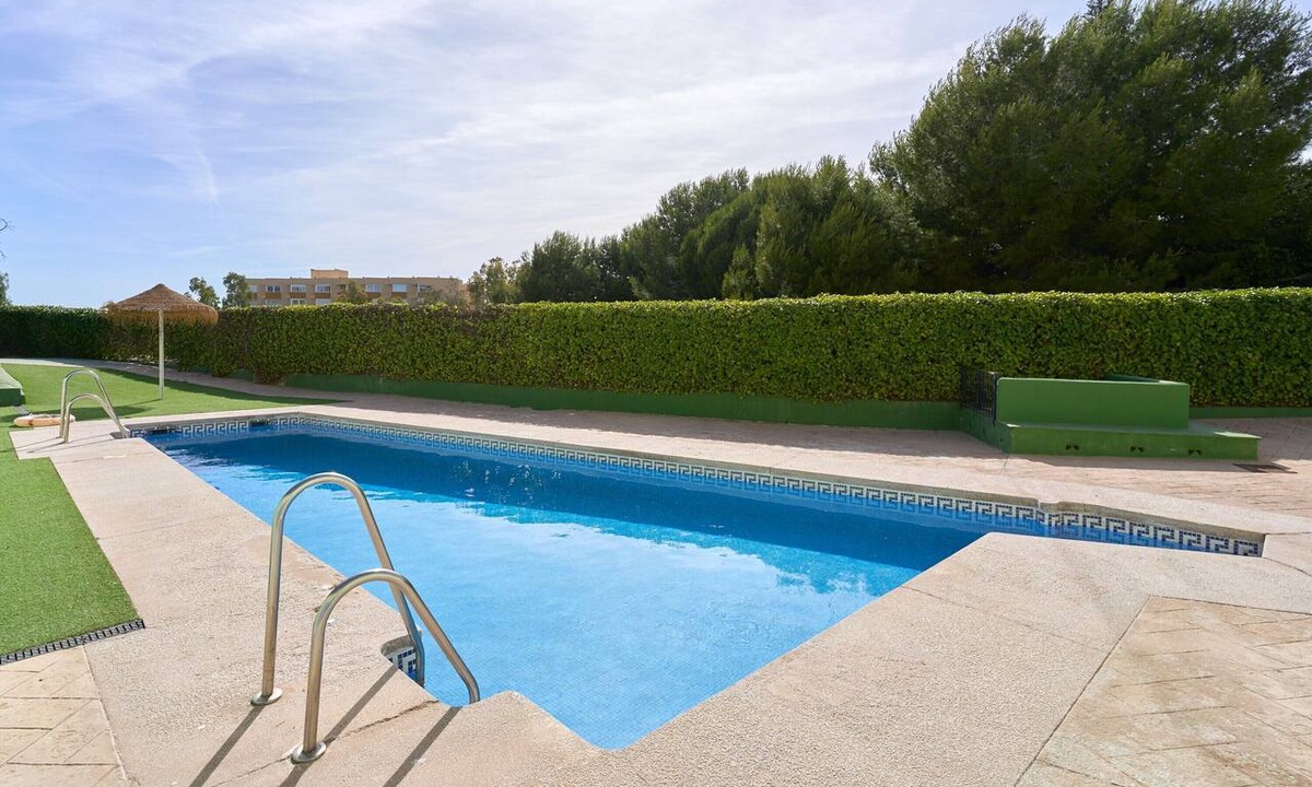 Benajarafe Apartment | Apartment 'Adosado Con Piscina Benajarafe' with Balcony, Wi-Fi and Air Conditioning