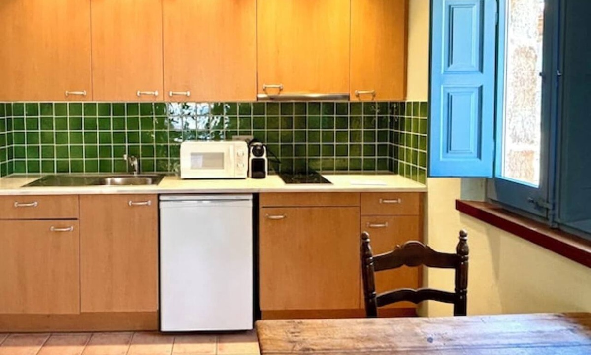 Ullastret Apartment | EL FORT DúLLASTRET. Apartment 4. Double room, sofa bed and balcony.