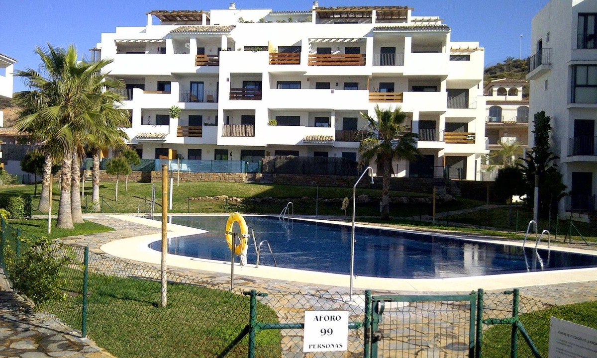 La Cala de Mijas Apartment | Lovely apartment in Alamar with pool, balcony & wi-fi. Short walk to the beach.