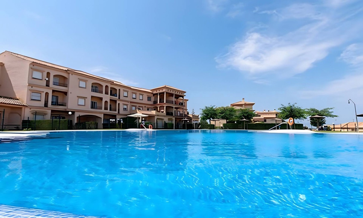 Sanlucar de Barrameda Apartment | Sanlúcar Club Terrace & Summer Pool – Views of Coto Doñana