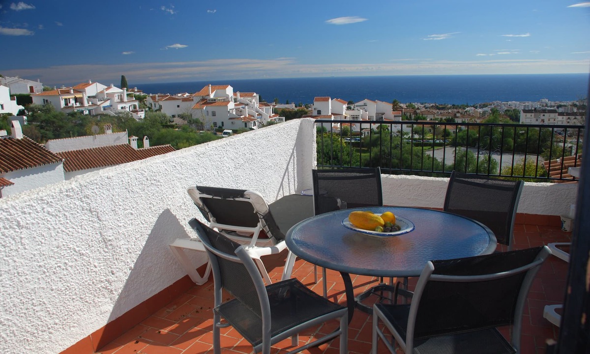 Nerja Apartment | Townhouse with stunning views and pool area, large sunny terrace