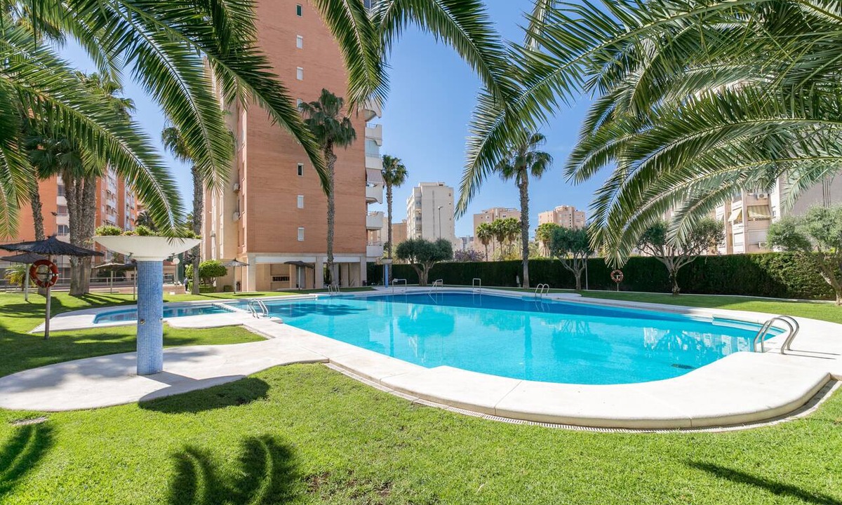 Playa de San Juan Apartment | 'Urbanización Bulevar Playa' Apartment with Shared Pool, Wi-Fi, and Air Conditioning