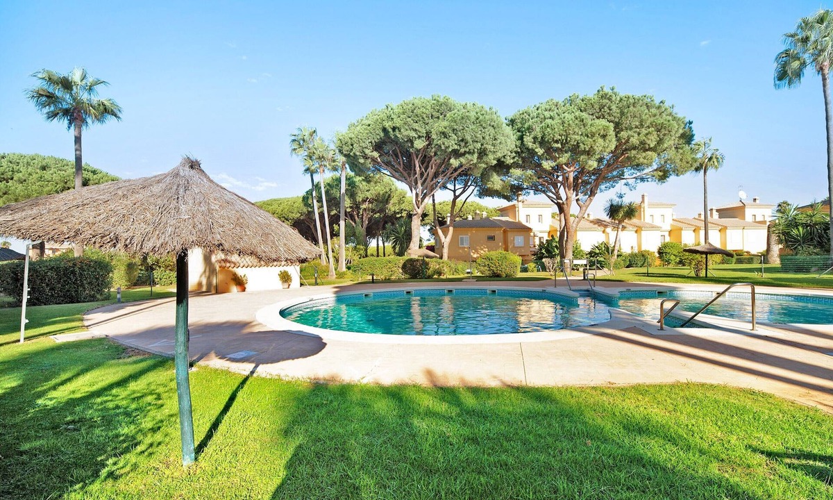 Chiclana de la Frontera House | Vacation Home "Chalet Cormoran" with Private Terrace, Shared Pool & Wi-Fi