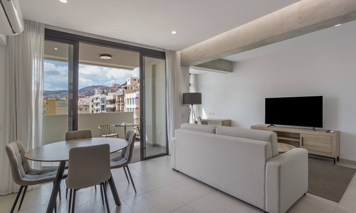 Santa Cruz de Tenerife Apartment | Vacation Apartment 'Obsidian Ático Mencey City' with Balcony, Wi-Fi and Air Conditioning