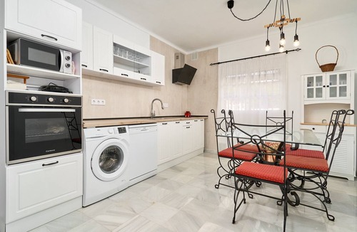 Benajarafe Apartment | Apartment 'Adosado Con Piscina Benajarafe' with Balcony, Wi-Fi and Air Conditioning