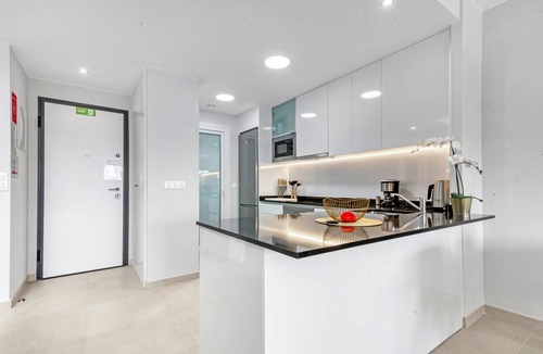Flamenca Beach Apartment | Apartment 'Flamenca Village' with Shared Pool, Wi-Fi and Air Conditioning