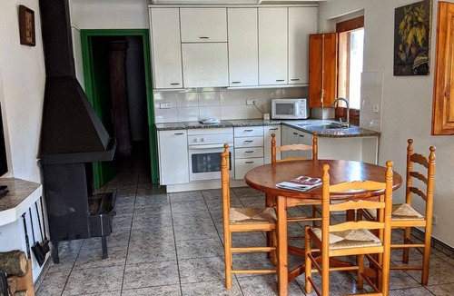 Santa Pau Apartment | Apartment 'Mas El Carrer - Verd' with Shared Pool, Shared Garden and Wi-Fi
