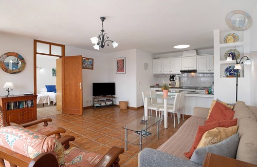 Playa Blanca Apartment | Apartment "Puerto Chico 8" with Sea View, Shared Pool, Terrace & Wi-Fi