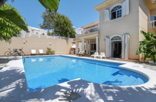 Playa del Cable Apartment | Bayside Concha House - Beachfront Oasis with Heated Pool