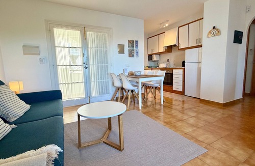 Arenal d'en Castell Apartment | Beautiful Apartment with Wi-Fi, Pool, Terrace and Sea View