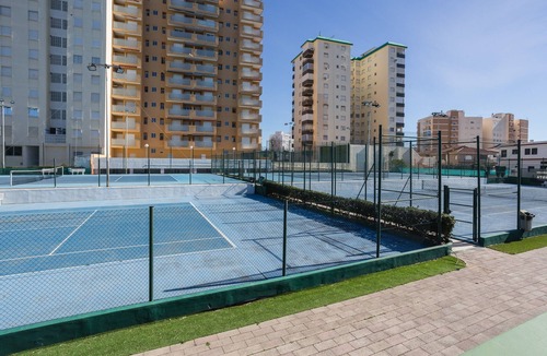 Sueca House | Bungalow 'Adosado Mareny Blau' with Shared Pool, Wi-Fi and Air Conditioning
