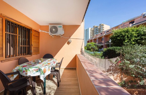 Sueca House | Bungalow 'Adosado Mareny Blau' with Shared Pool, Wi-Fi and Air Conditioning