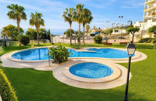 Coveta Fuma Apartment | Costa Blanca, Right on the Beach. With private sun terrace, Beautiful resort