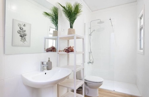 San Isidro Apartment | Eden Rentals 106 Surfy Stylish BedandCoffee Room
