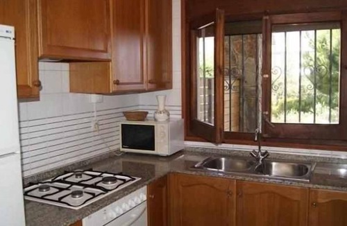 Ciudad Universitaria Apartment | Fener de Baix 83 House with garden and sea views