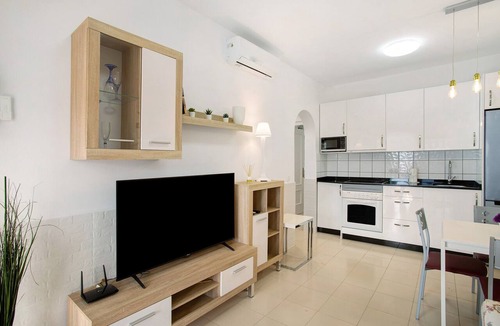 Puerto Rico Apartment | Holiday Apartment 'Casa Los Veleros F1' with Sea View, Wi-Fi & Air Conditioning
