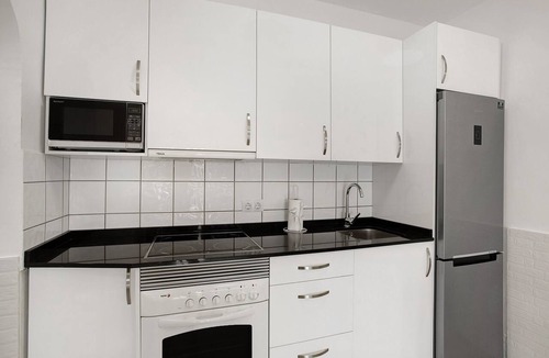 Puerto Rico Apartment | Holiday Apartment 'Casa Los Veleros F1' with Sea View, Wi-Fi & Air Conditioning