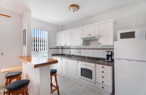 Los Cristianos Apartment | Holiday Apartment 'Central Los Cristianos' with Mountain View, Pool and Wi-Fi