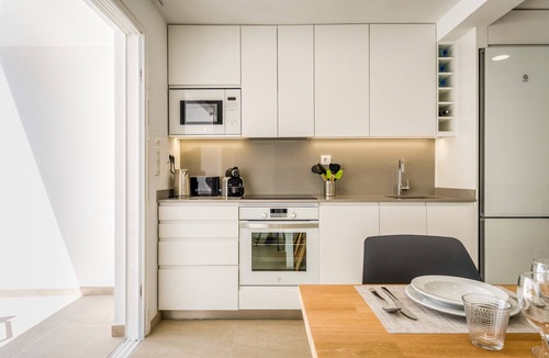 Cala Blanca Apartment | Holiday Home 'Els Arbocers 131-2' with Sea View, Garden and Wi-Fi
