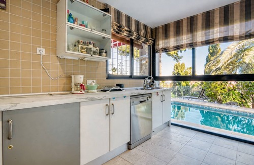 Moraira Villa | Holiday Home 'Palmeras' with Sea Views, Wi-Fi and Air Conditioning