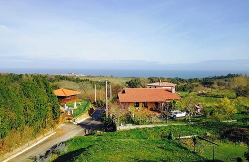Llamigo House | House with views to the sea and Picos Europa. Large garden. Unique rural location.