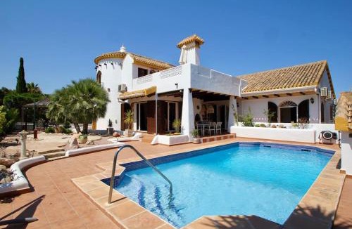 Villamartin Villa | Ibiza style villa first line to golf!