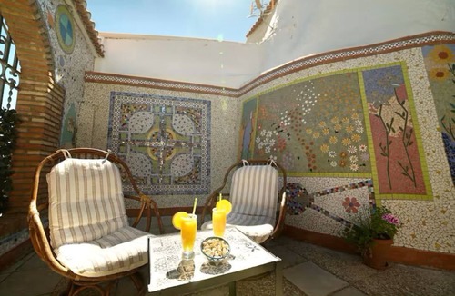 Guadix Cottage | Los Mosaicos Cave. Sleep in a Luxury Cave House with a Sunny Terrace—Guadix
