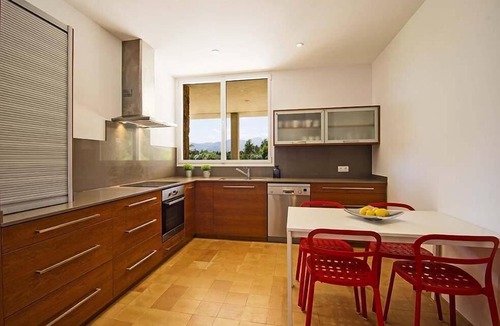 Pollensa Villa | Luxury modern stone clad Villa with swimming pool and mountain views