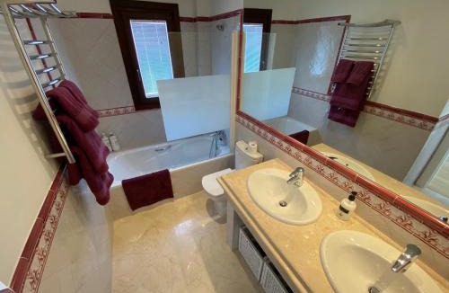 Casares House | Stylish 3 bed house 2 bathrooms, with patio, roof terrace and communal pool 5 minutes away from the beautiful Spanish white village of Casares Pueblo and only 20 mins from the sea