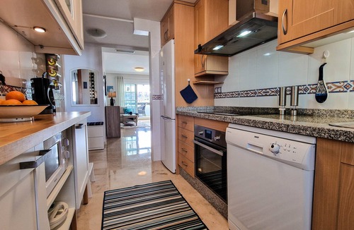 San Luis de Sabinillas Apartment | Stylish Penthouse Near Duquesa Marina – Pools, Terrace & 10-Min Walk to Beach!
