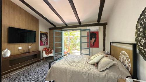 Moura Brasil House | Suite com jardim privativo - Casa das Bromélias - 02