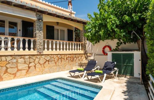 Cala en Porter Villa | Villa Mari - con piscina privada y jardin en Calan Porter