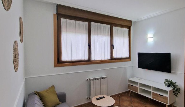 Apartamento familiar con jardín y parking privado