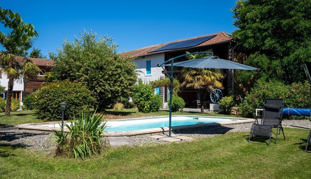 Au Peïmarti - Avec piscine privée in Castex
