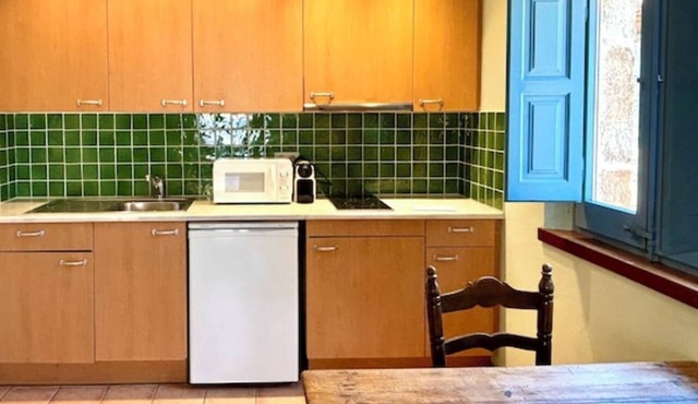 EL FORT DúLLASTRET. Apartment 4. Double room, sofa bed and balcony.
