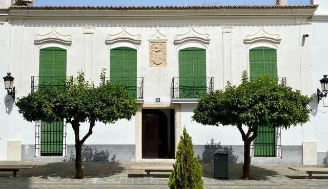 Historic stately home facing templar castle and church in Olivenza