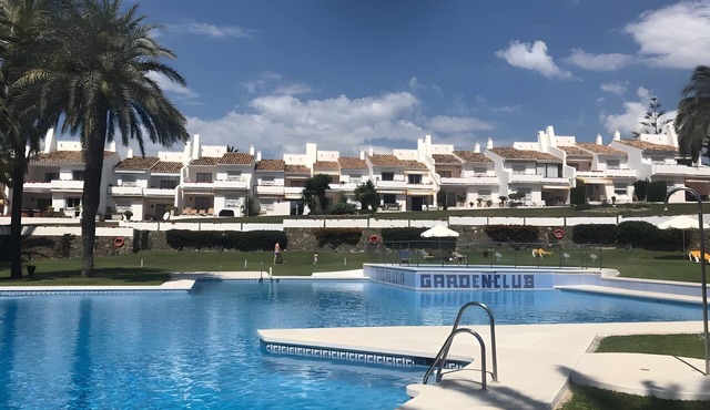 Holiday Home 'Beautiful 4 bedroom Townhouse' with Shared Pool, Wi-Fi and Air Conditioning
