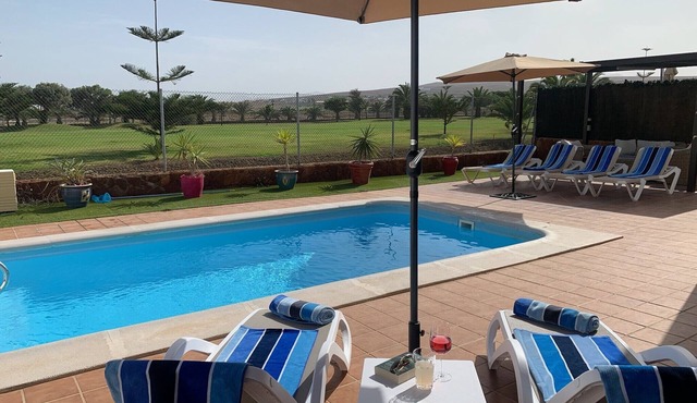 Lovely villa - all day sun, heated private pool with golf views, close to beach