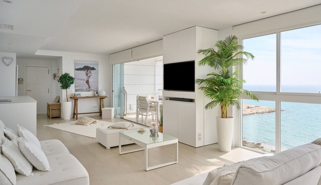 Luxury Beachfront Apartment with Sea Views, Pool, Garden & Wi-Fi