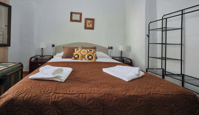 Luxury bedroom at Los Retamales with a queen-size bed, Casa Mathilda