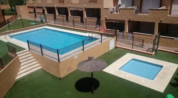 Marina de Casares suit