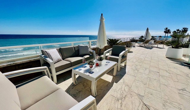 New Listing, Unique apartment beachfront. Large terrace to the sea