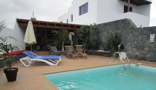 private pool with huge games room inviting to relax and have fun