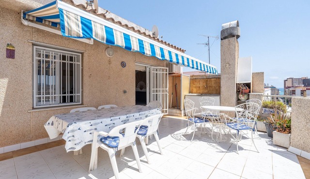 Vacation Apartment "Ático Cesar Cataldo" Near the Beach with Private Terrace