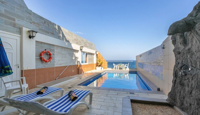 Vacation Home 'Seaside House with Heated Pool' with Sea View, Wi-Fi and Air Conditioning in Punta Prieta