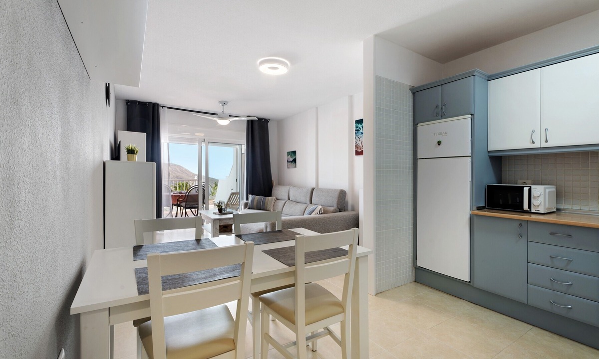 Chayofa Apartment | Vacation Apartment 'Isabel Vista Sur' with Sea View, Shared Pool and Wi-Fi