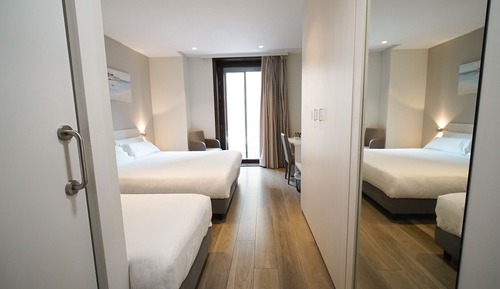 Triple Room (2 adultos + 1 niño)