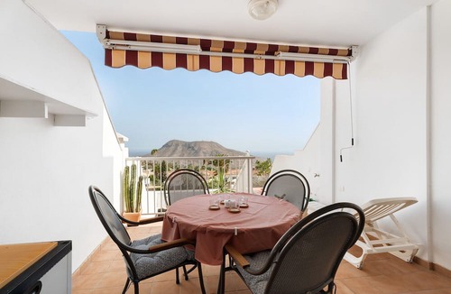 Chayofa Apartment | Vacation Apartment 'Isabel Vista Sur' with Sea View, Shared Pool and Wi-Fi