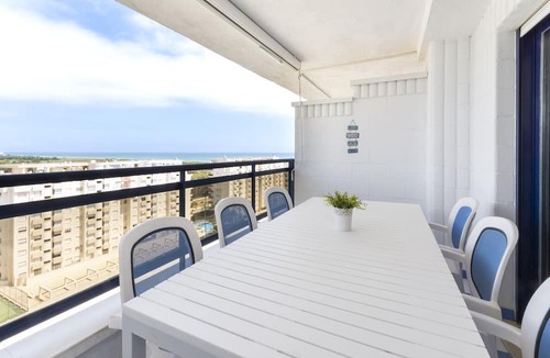 Playa de Gandia Apartment | Decorated in modern style, with wifi free, International channels, BBQ, children's area, - only families